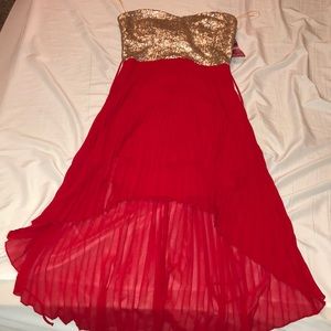 Red and gold strapless high low dress